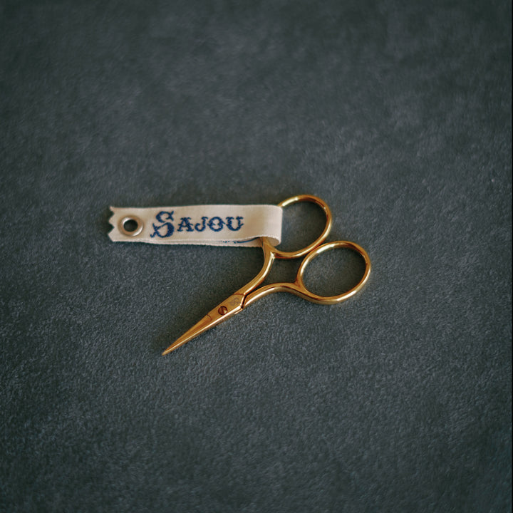 Sajou Flagey gilded miniature embroidery scissors, 2.5", with Sajou ribbon and signature box on blue suede.