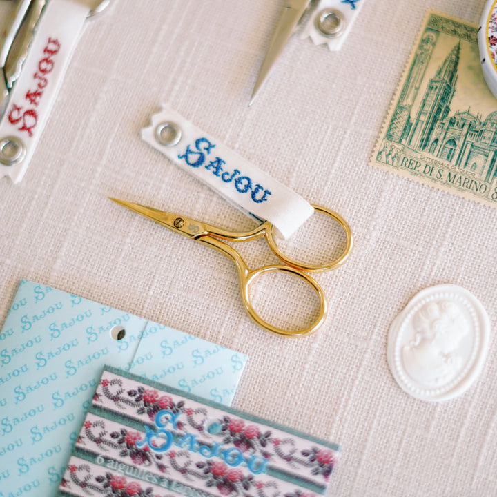 Sajou Flagey gilded miniature embroidery scissors, 2.5", with Sajou ribbon and signature box on linen.