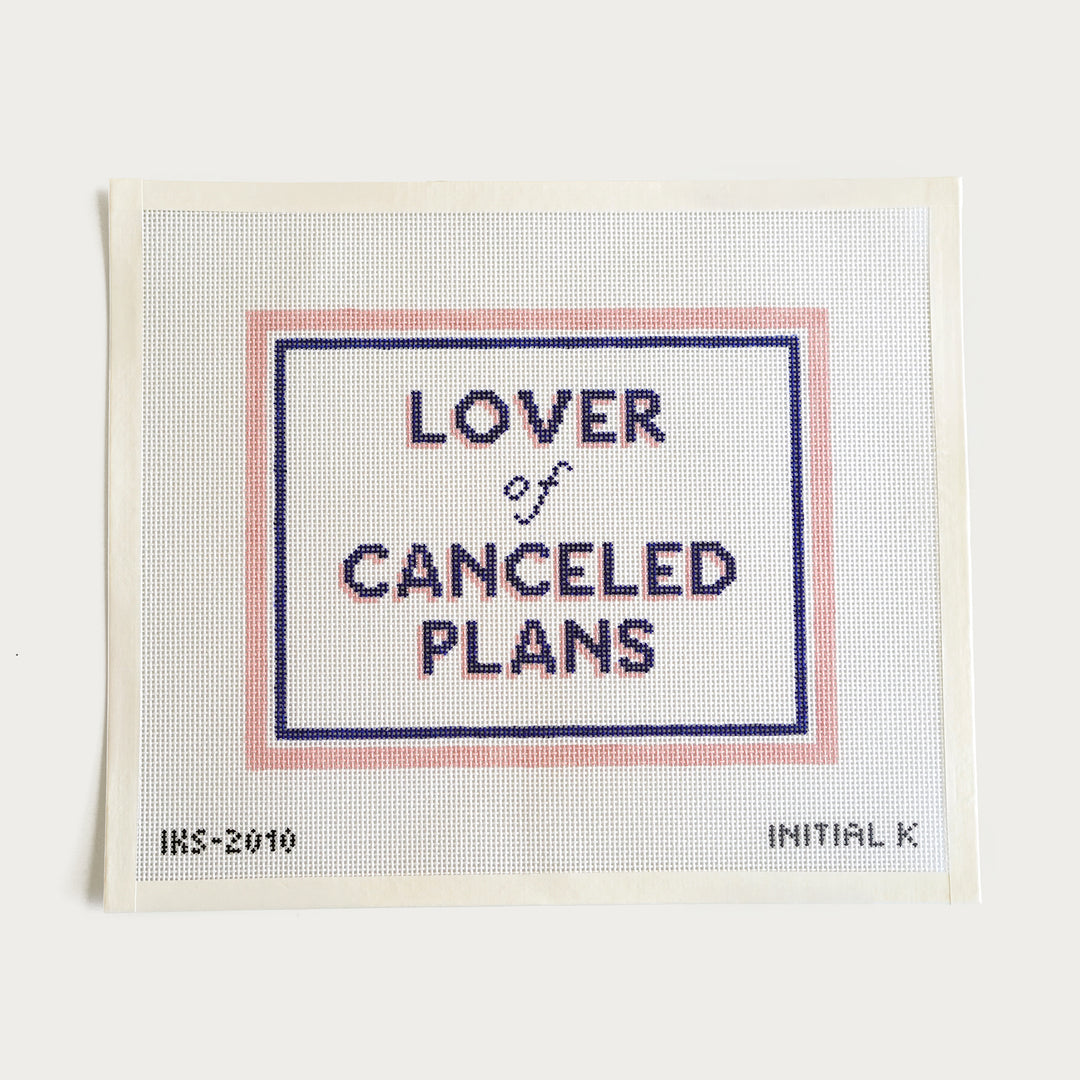 Hand-painted needlepoint canvas with pink and navy design reading Lover of Canceled Plans on 13 mesh, 9 x 7 inches