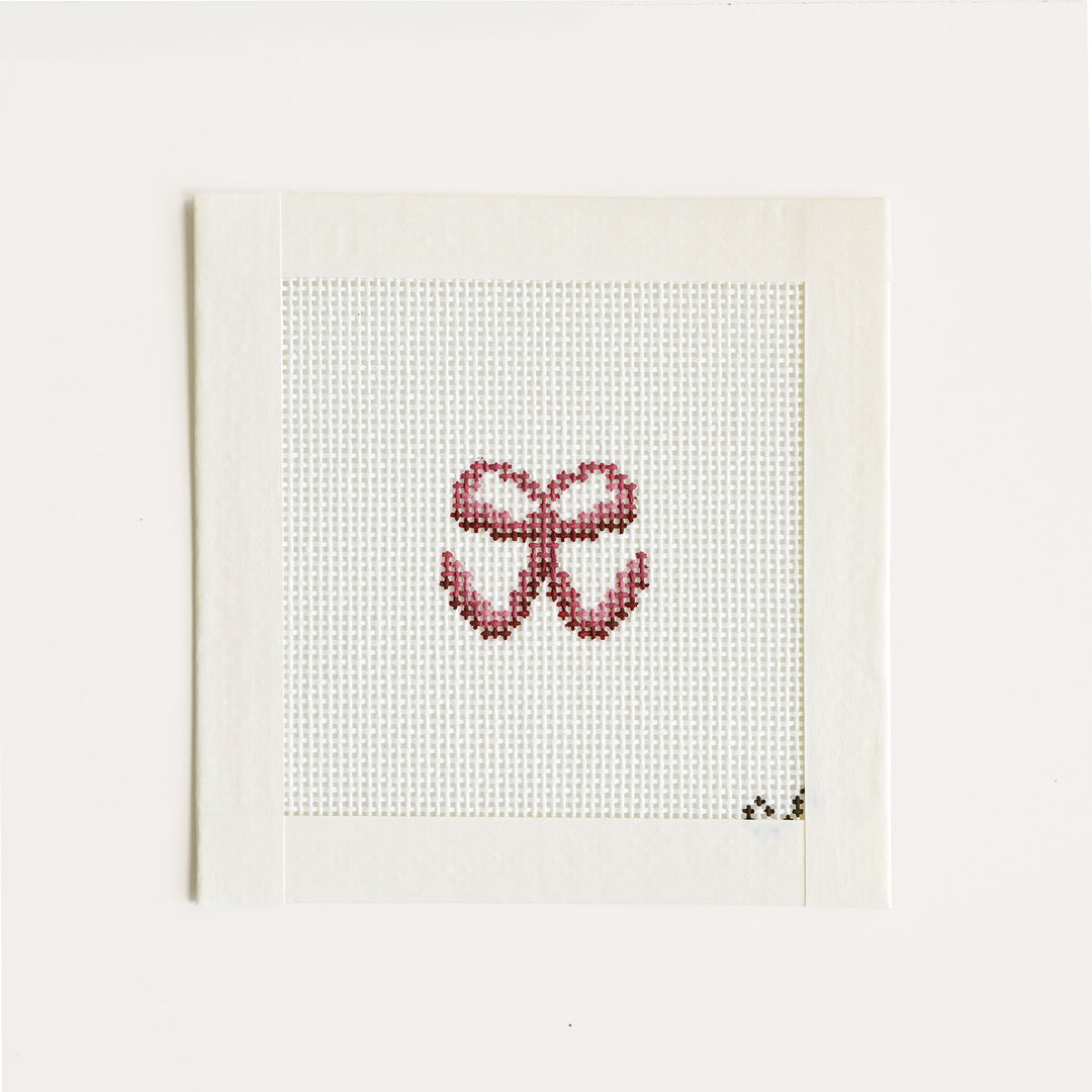 Mini red bow needlepoint canvas hand-painted on 18 mesh, approximately 1.5 by 1.5 inches