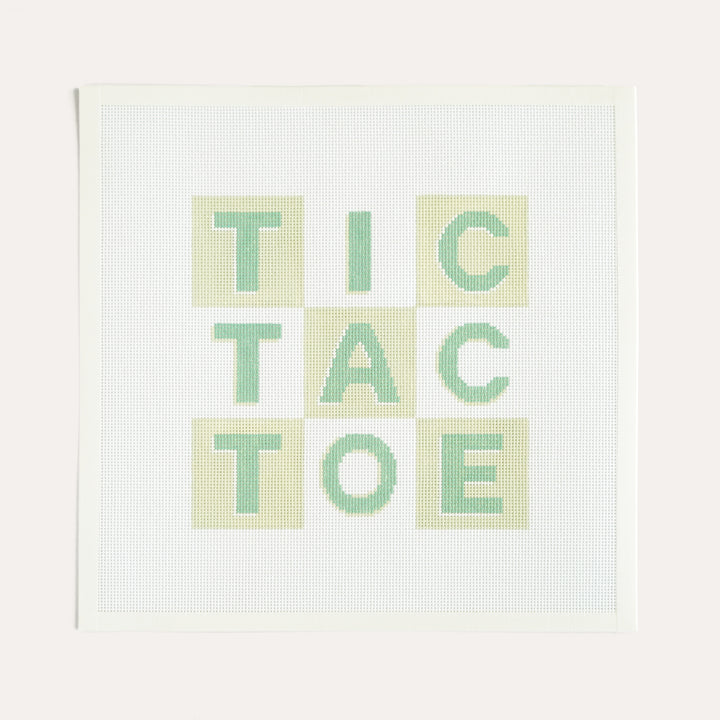 Green Tic-Tac-Toe needlepoint canvas by The Needlepoint Vault on 13 mesh, finished as game board pillow or framed