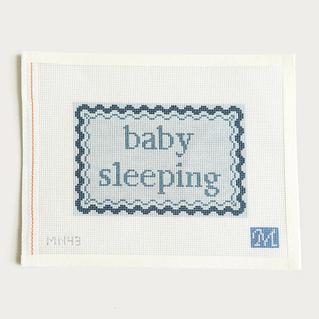 Hand-painted Baby Sleeping needlepoint canvas in blue, 10.5" x 5.8" on 13 mesh. A charming nursery or baby room décor piece.