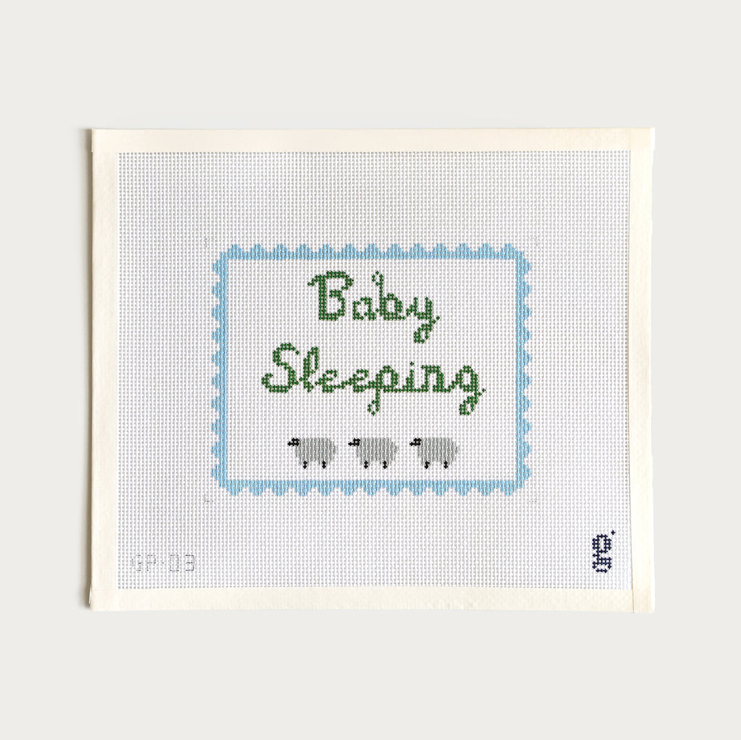  Baby Sleeping needlepoint canvas in blue and green, 6.6” x 5.3” on 13 mesh, perfect for a nursery.