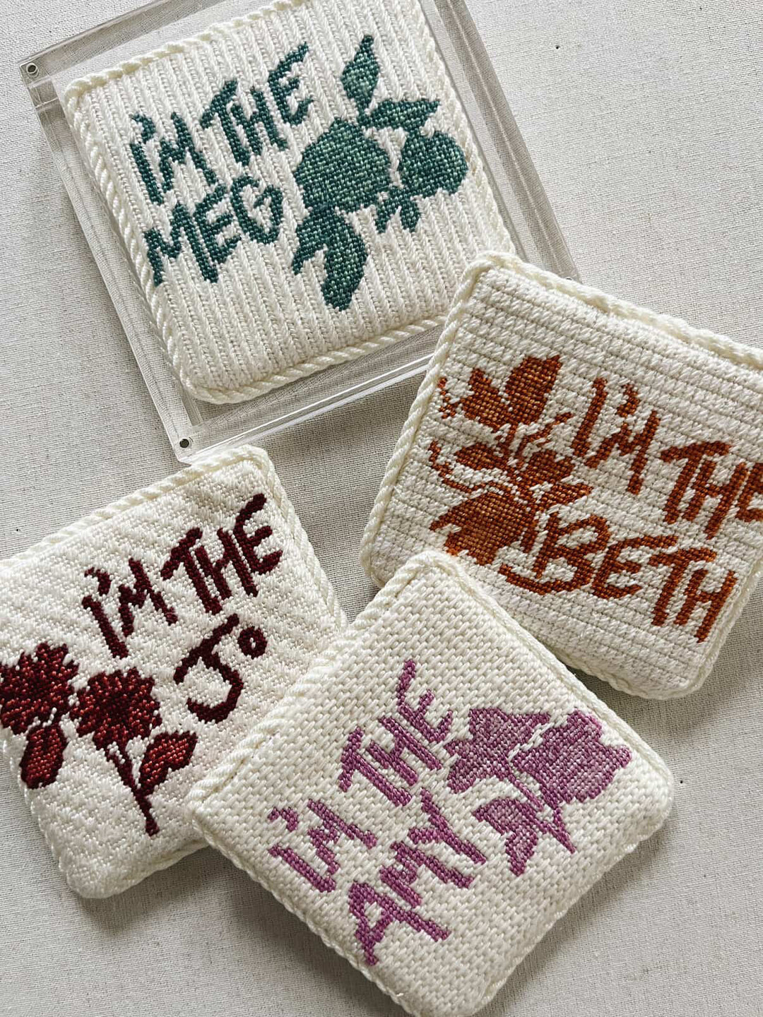 Acrylic magnetic needlepoint coaster used for displaying needlepoint projects up to 4"x4"