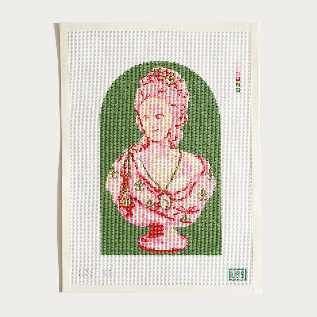 Marie Antoinette needlepoint canvas, 6.75" x 10.75" on 13 mesh, pink bust on green background.