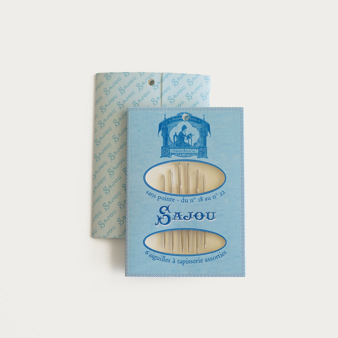 Sajou tapestry needles in blue booklet, assorted sizes 18-22, high-quality French-made needlepoint needles.