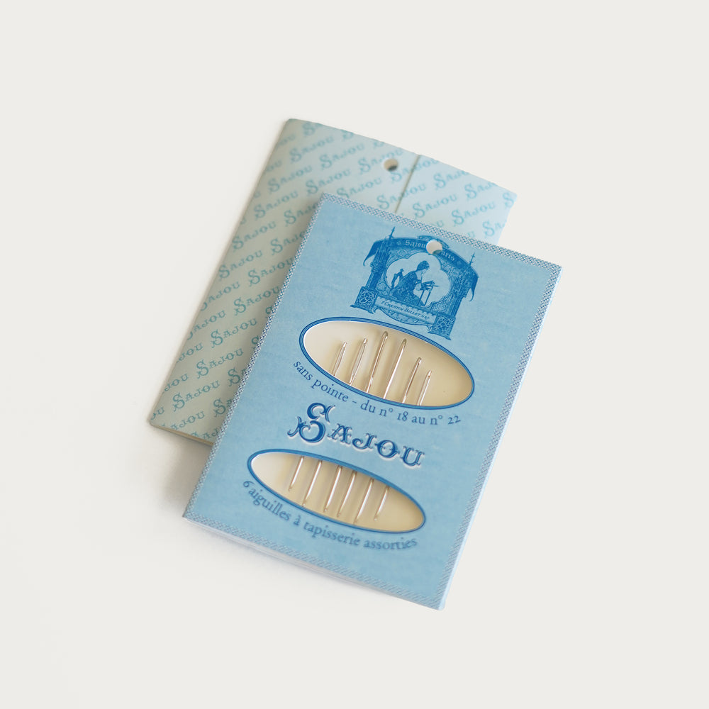 Sajou tapestry needles in blue booklet, assorted sizes 18-22, high-quality French-made needlepoint needles.