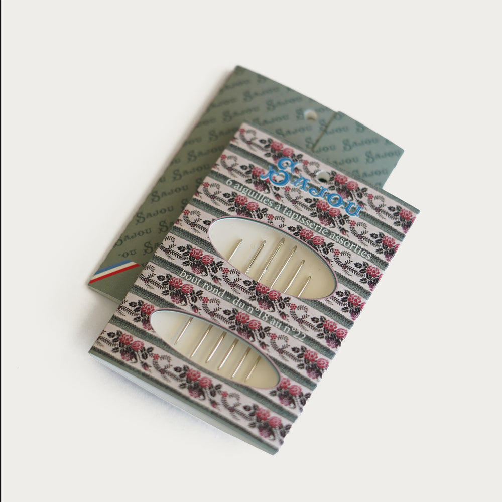 Sajou tapestry needles in green floral booklet, assorted sizes 18-22, high-quality French-made needlepoint needles.