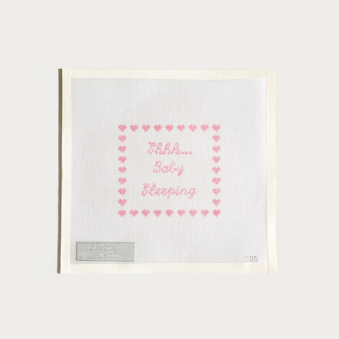 Hand-painted Shhh... Baby Sleeping needlepoint canvas (5 1/2" x 5 1/2" on 18 mesh) in pink, perfect for nursery decor.