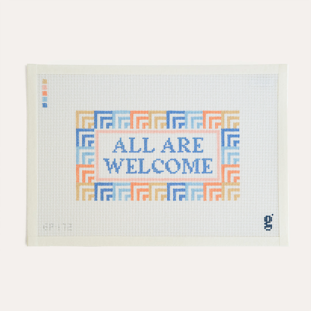 All Are Welcome stitch-painted needlepoint canvas by Good Point Needlepoint featuring a welcoming message on 13 mesh