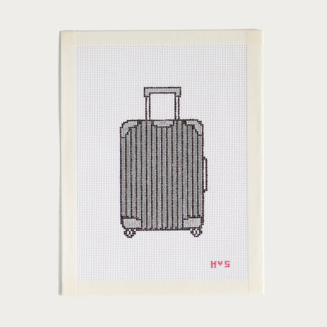 Hand-painted Aluminum Luggage needlepoint canvas with a travel-inspired design.