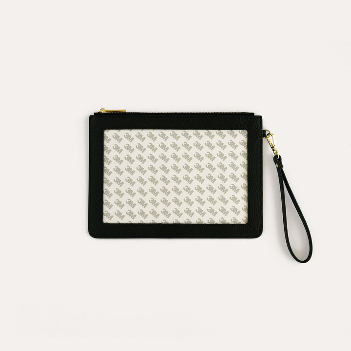 True black leather self finishing needlepoint wristlet with gold hardware