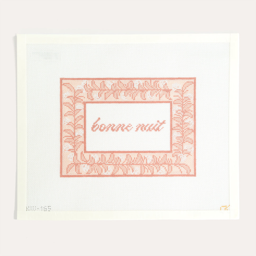 Bonne Nuit Sign Pink needlepoint canvas by Kate Woodward featuring a pink French-inspired sign on 18 mesh canvas.