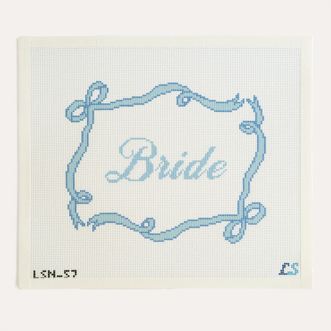 Bride Sign wedding needlepoint canvas by Lake Shore Needlepoint with light blue script lettering and blue bow border on 13 mesh