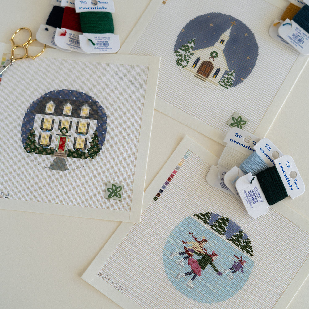 Christmas Chapel, ice skating, and Christa's Clapboard house needlepoint canvases on 18 mesh by Dogwood Needlepoint