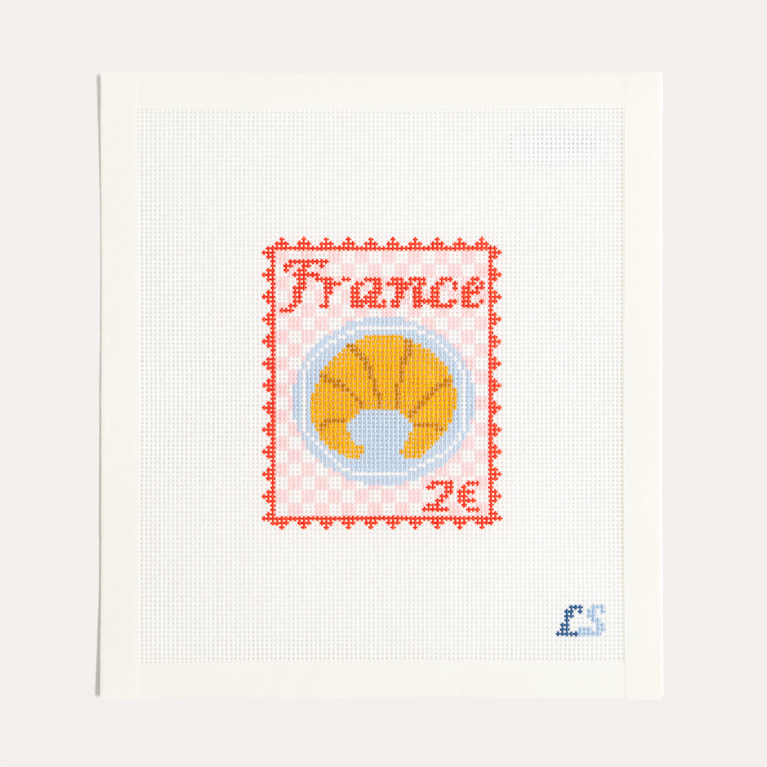 France Postage Travel Stamp needlepoint canvas by Lake Shore Needlepoint featuring a croissant on 18 mesh canvas