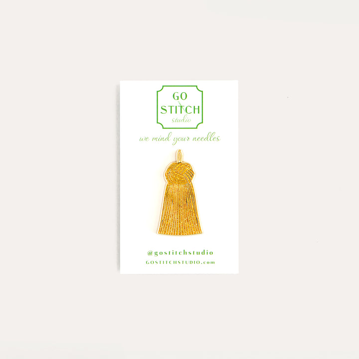 Gold glitter tassel needle minder by Go Stitch Studio with secure magnet