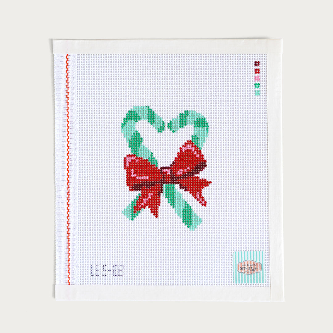 Hand-painted Heart-Shaped Christmas Canes needlepoint canvas on 13 mesh, featuring festive candy canes arranged in a heart shape.