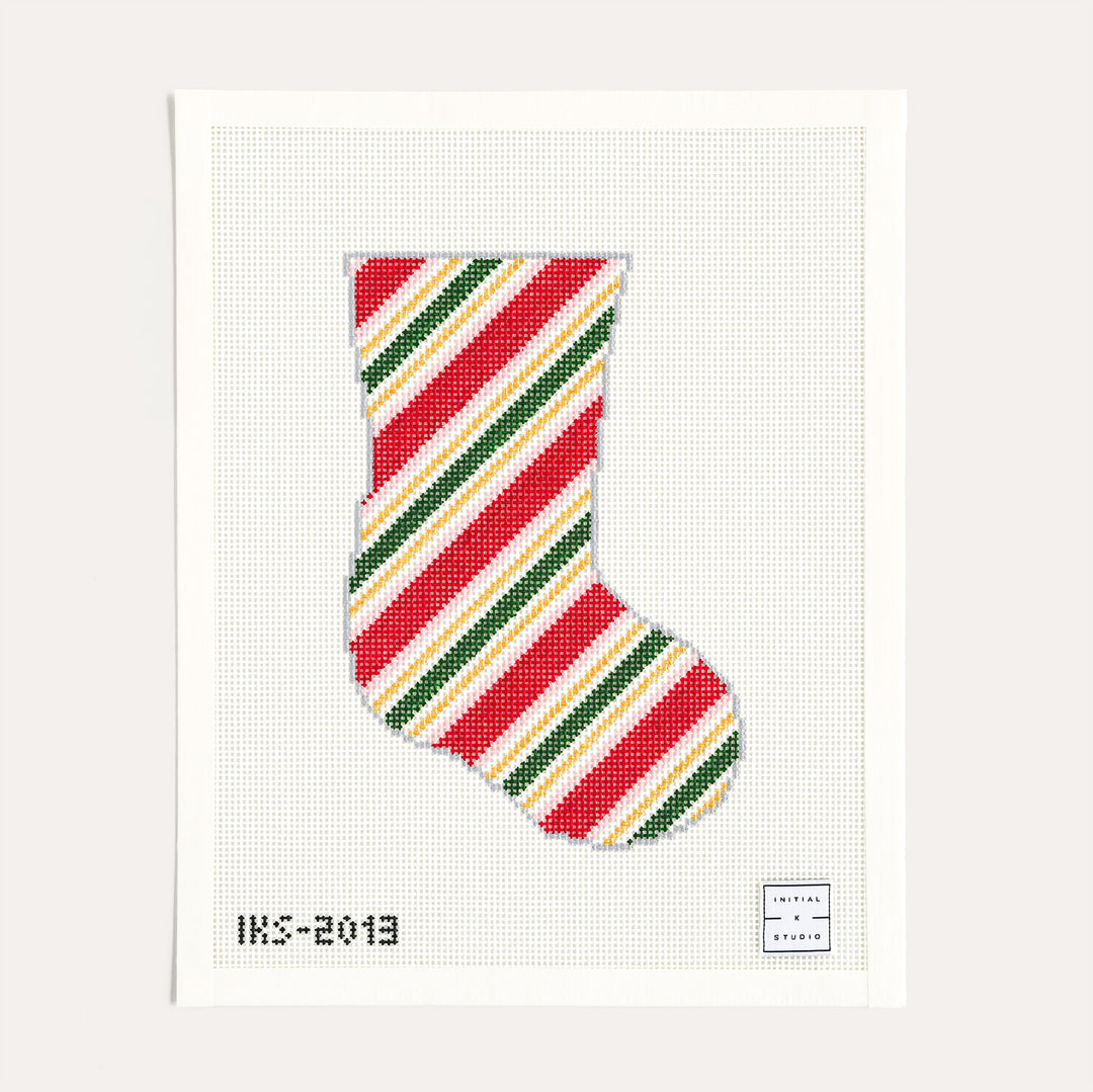 Holiday Wrap Mini Stocking needlepoint canvas by Initial K Studio in red, green, pink, and gold, 13 mesh