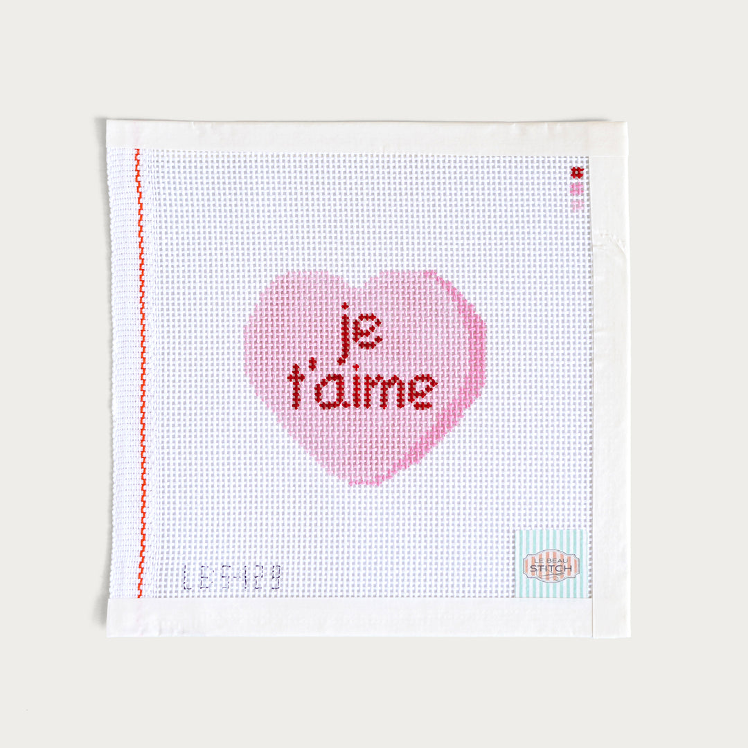 Hand-painted ‘Je T’aime’ Candy Conversation Heart needlepoint canvas on 13 mesh, featuring a charming French-inspired Valentine’s design.