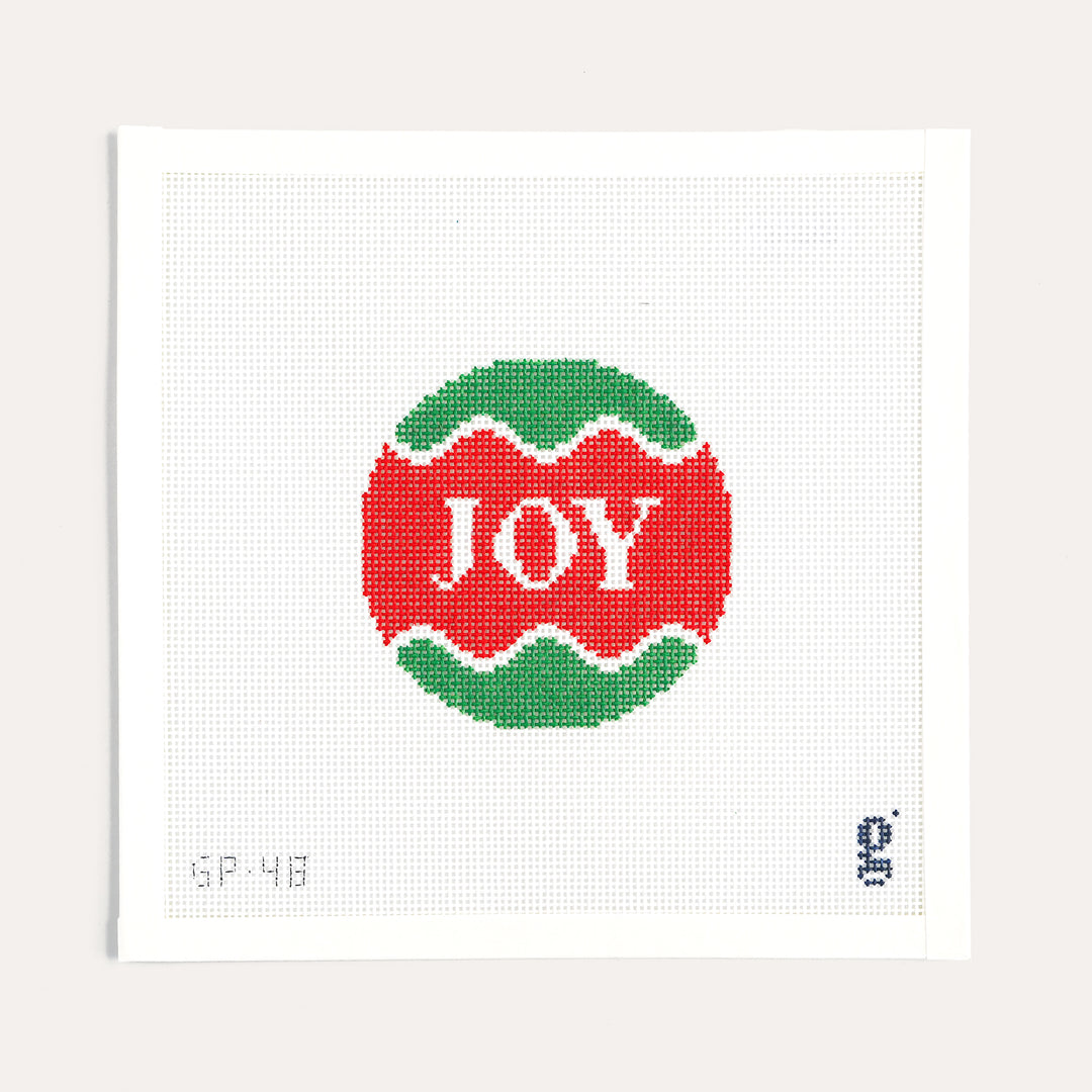 4 inch round holiday needlepoint canvas with Joy motif on 13 mesh by Goodpoint Needlepoint