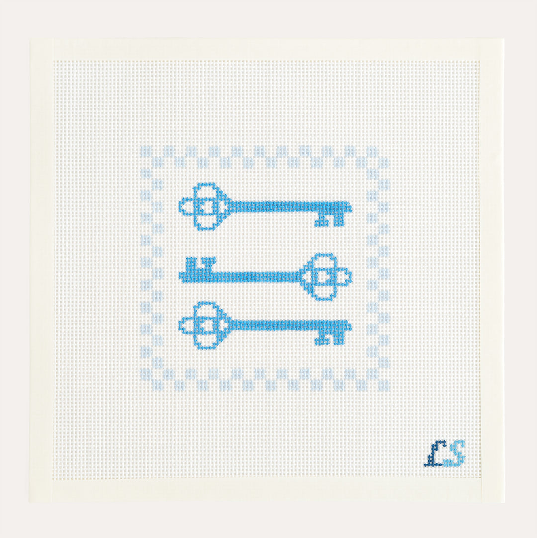 Keys needlepoint canvas by Lake Shore Needlepoint with blue keys and checkered border on 13 mesh canvas