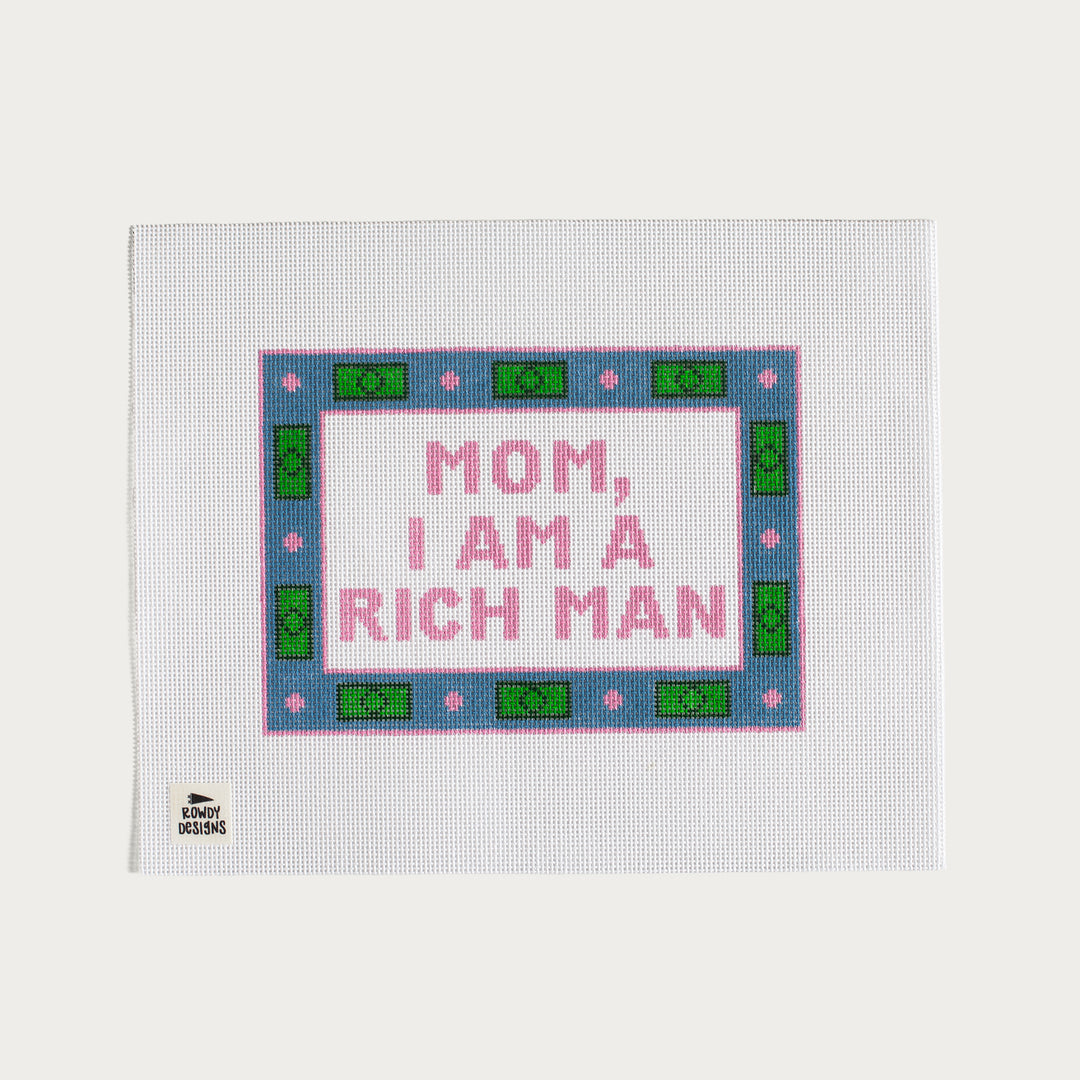 Hand-painted Mom, I Am A Rich Man needlepoint canvas with an empowering statement design.