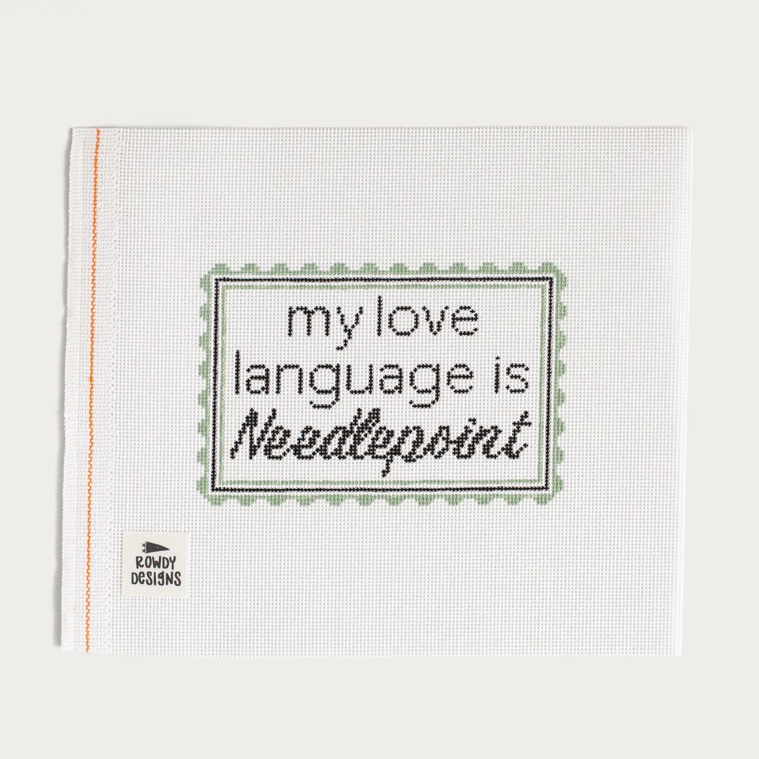 Hand-painted My Love Language Is Needlepoint canvas with a stitcher's statement design.