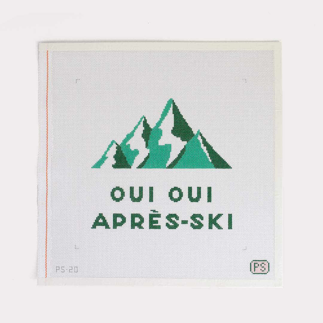 Hand-painted ‘OUI OUI APRÈS-SKI’ needlepoint canvas on 13 mesh, inspired by mountain getaways and winter fun.