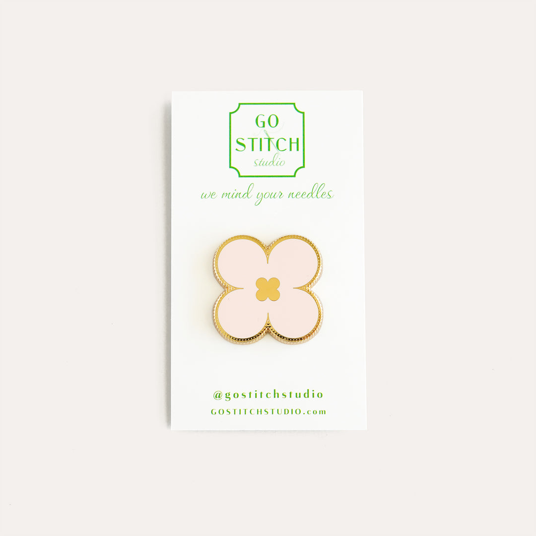 Pink clover needle minder by Go Stitch Studio with secure magnet