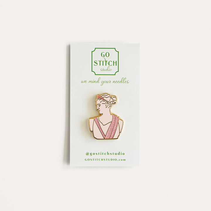 Pink Greek Goddess Needle Minder by Go Stitch Studio with enamel, gold accents, and glitter details