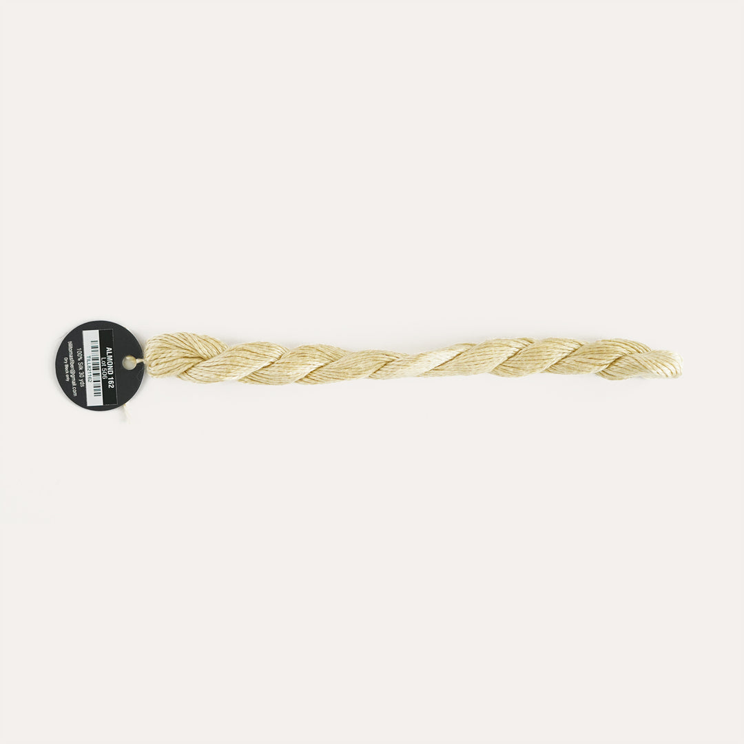 Planet Earth Silk in Almond 162 by Tilli Tomas, 100% silk needlepoint thread, 30 yard skein, suitable for 13 mesh canvas