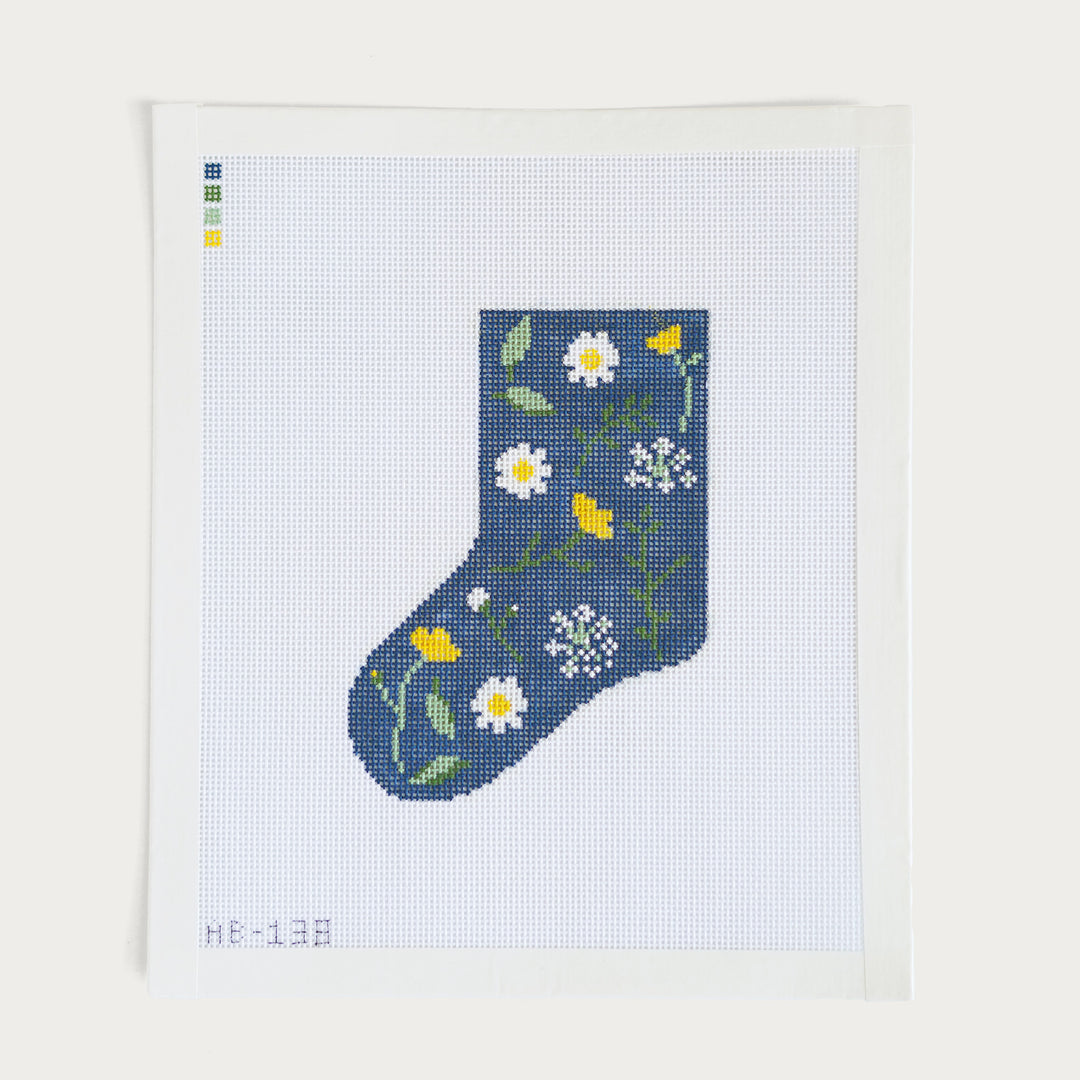 Hand-painted Pressed Floral Mini Stocking needlepoint canvas on 18 mesh, featuring delicate botanical details with a festive touch.