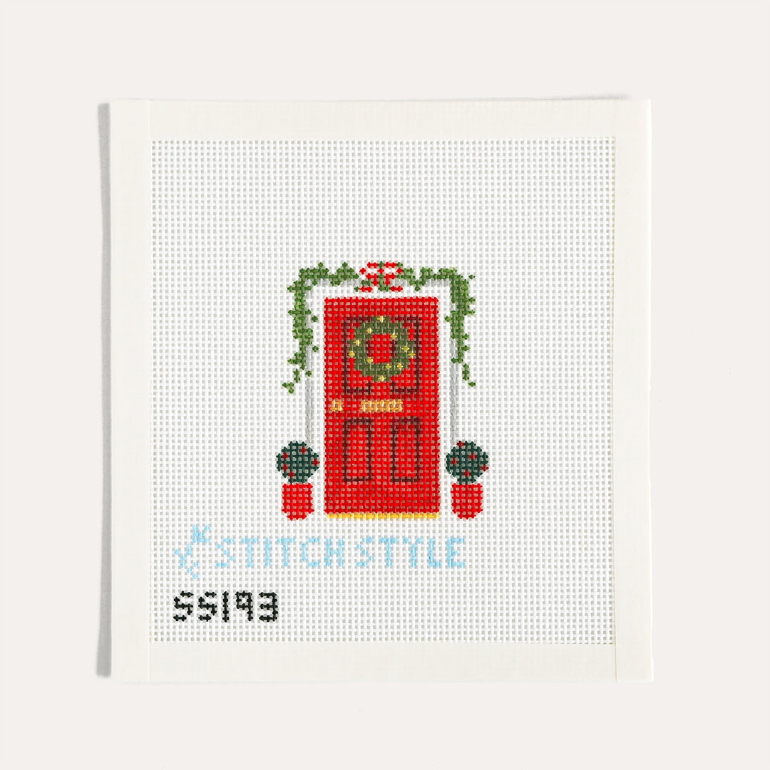 Red Christmas Door hand painted needlepoint canvas by Stitch Style on 13 mesh with stitch guide included