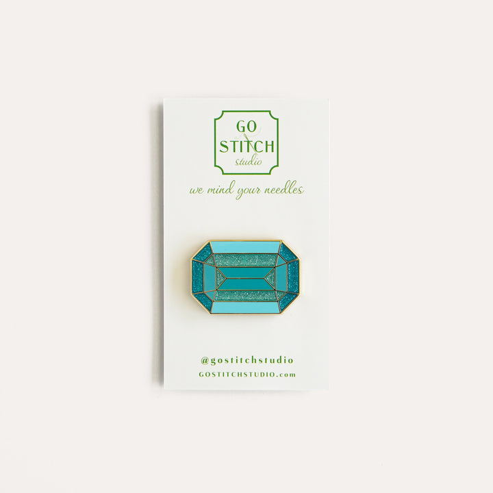 Roosevelt Aquamarine Needle Minder by Go Stitch Studio with aquamarine enamel and gold accents