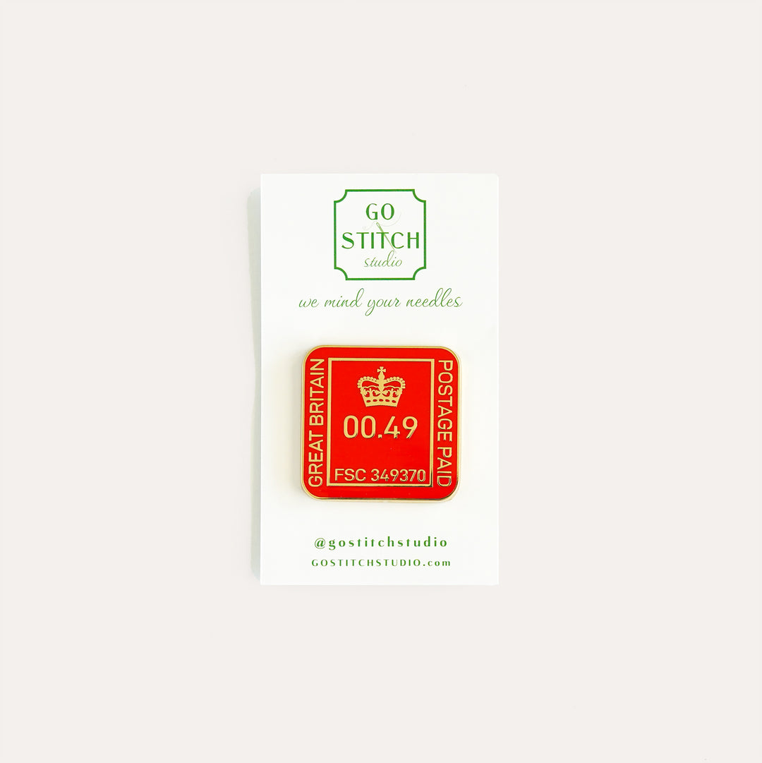Royal Postmark red and gold needle minder by Go Stitch Studio with enamel finish and rare earth magnets