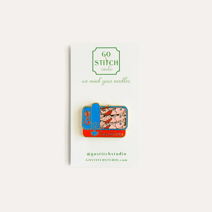 Sardines Needle Minder by Go Stitch Studio with enamel sardine tin design and gold accents