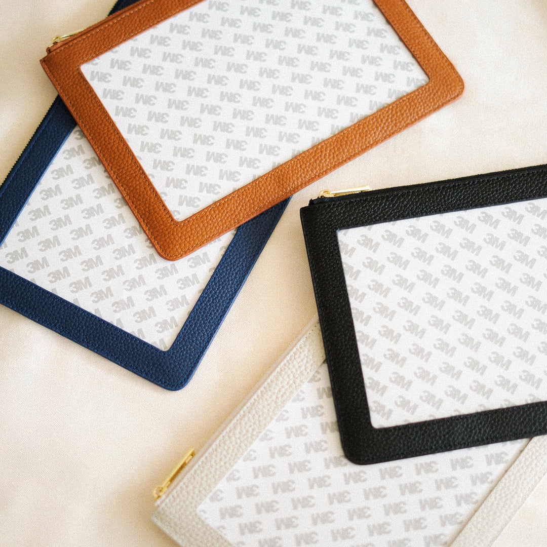 Leather self finishing wristlets for needlepoint canvases by the needlepoint vault in brown, black, beige, and navy