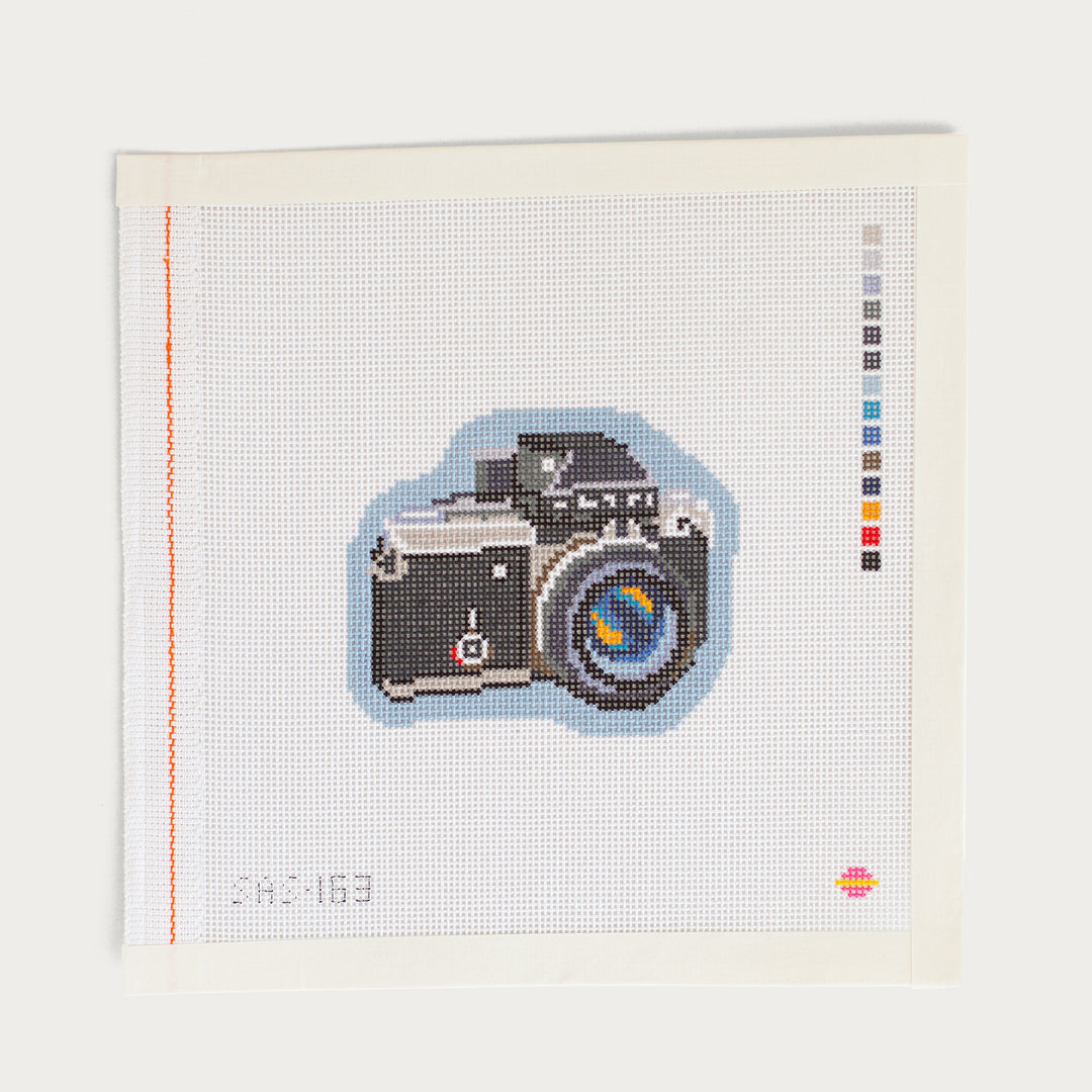 Hand-painted SLR Camera needlepoint canvas on 18 mesh, perfect for photography enthusiasts.