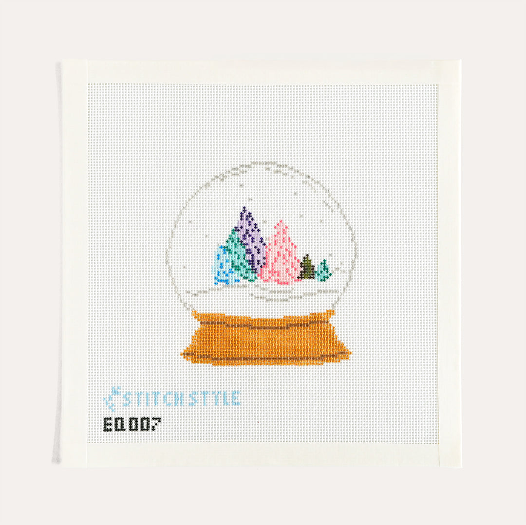 Snow Globe hand painted needlepoint canvas by Emily Quigley for Stitch Style on 18 mesh with colorful trees
