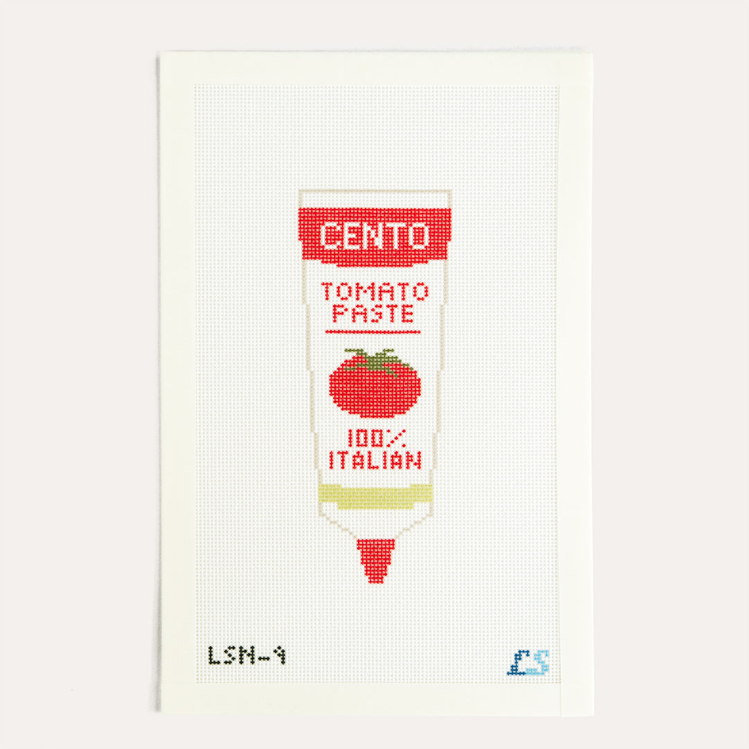 Tomato Paste needlepoint canvas by Lakeshore Needlepoint featuring a vintage-inspired tomato paste tube on 18 mesh canvas.