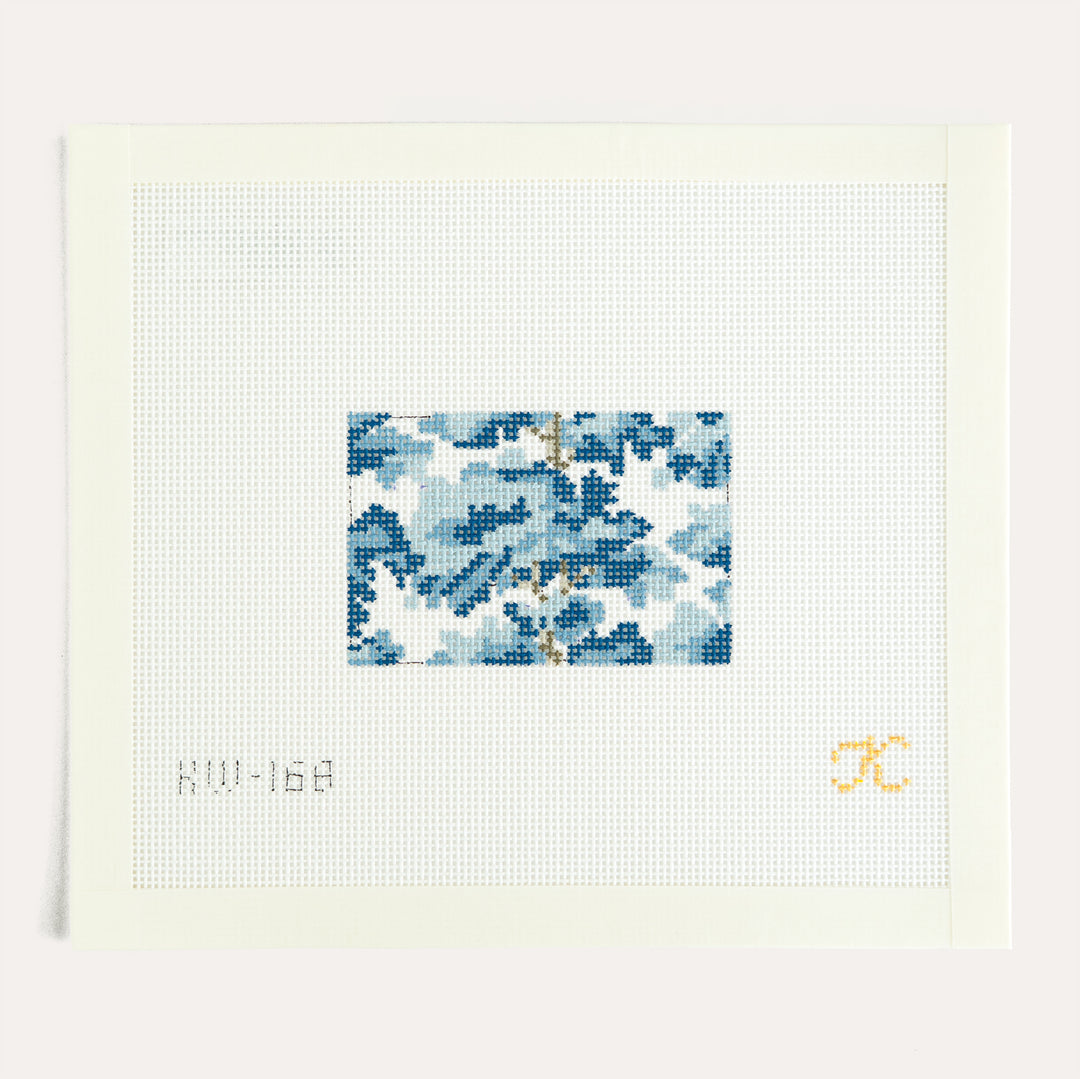 Tree Top Blue Luggage Tag needlepoint canvas by Kate Woodward featuring a blue luggage tag design on 18 mesh canvas.